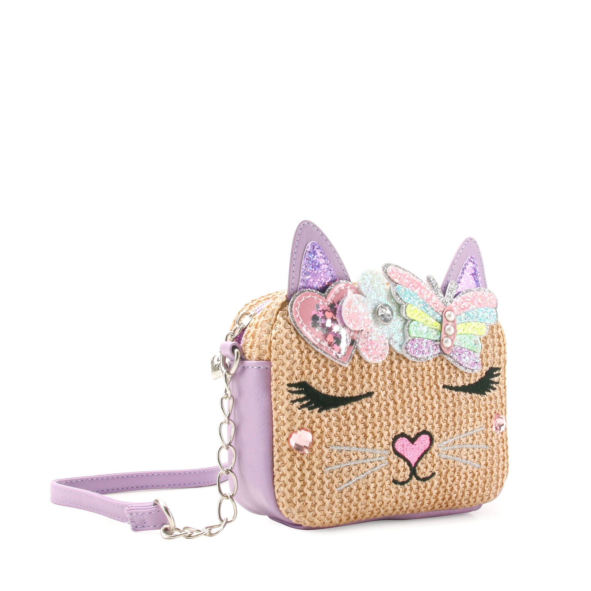 side  view of a straw kitty cat face crossbody bag with a glitter butterfly crown