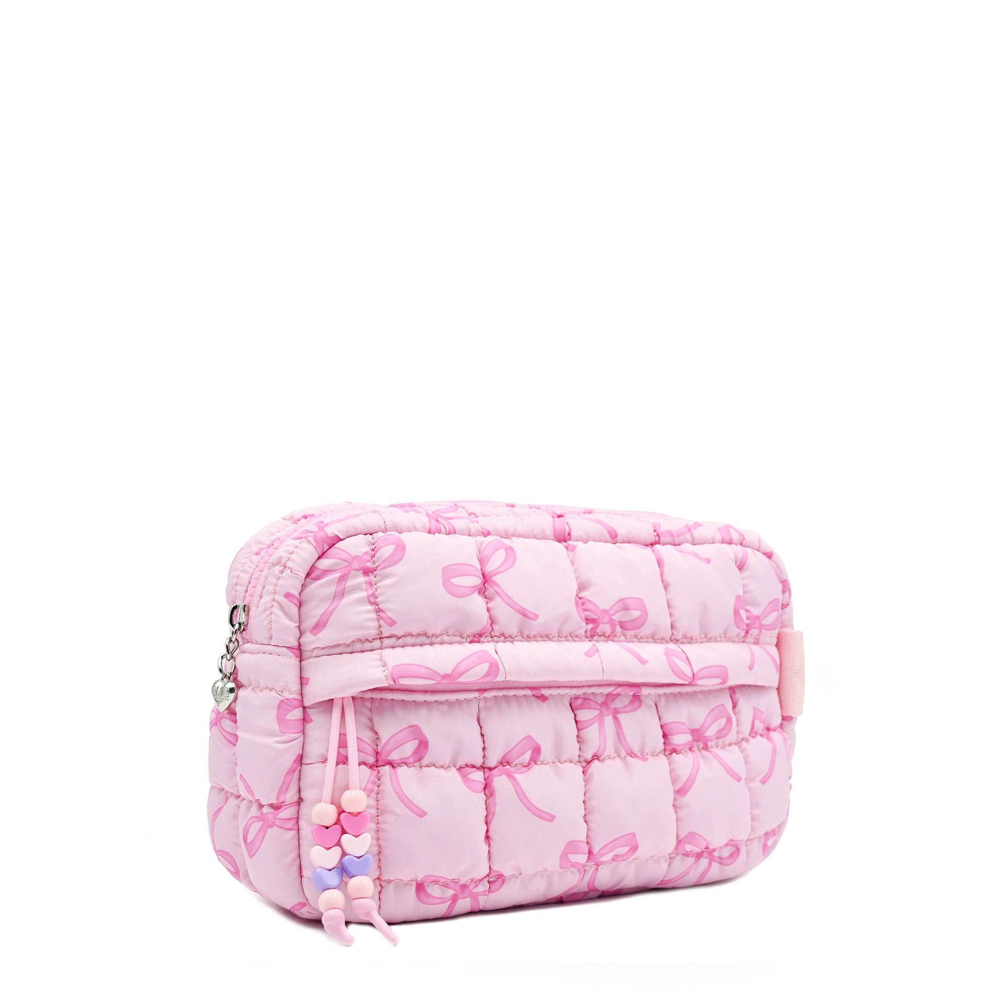 3/4 facing view of a pink quilted nylon pouch with a front beaded zipper pocket and pink bow printed pattern