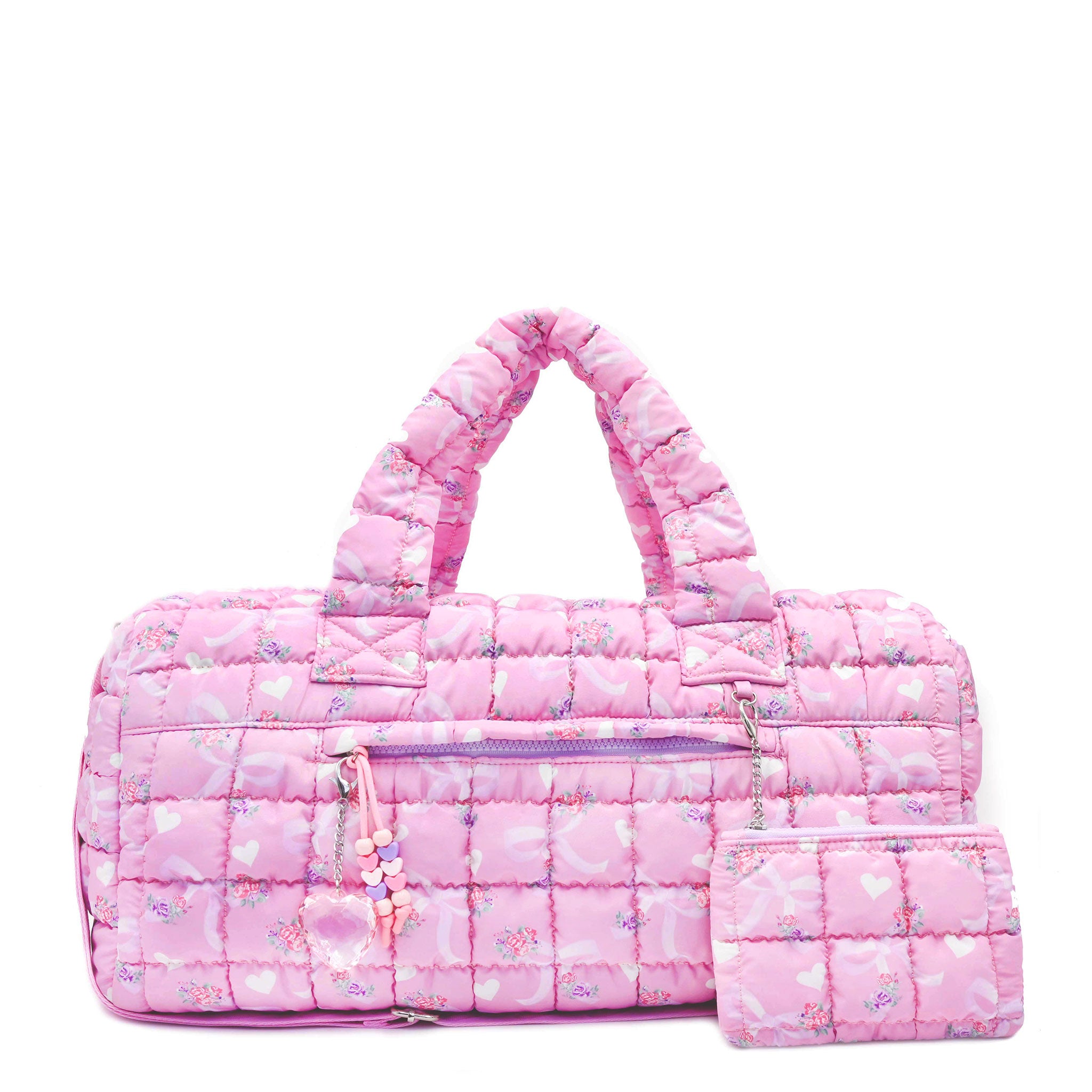 front facing view of a pink large sized quilted scrunch nylon duffle bag with a bow and heart print and front beaded zipper pocket with a crystal heart charm and matching detachable coin pouch