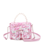 front view of a bow printed mini bag with beaded pearl handle & sequin bow applique on front flap