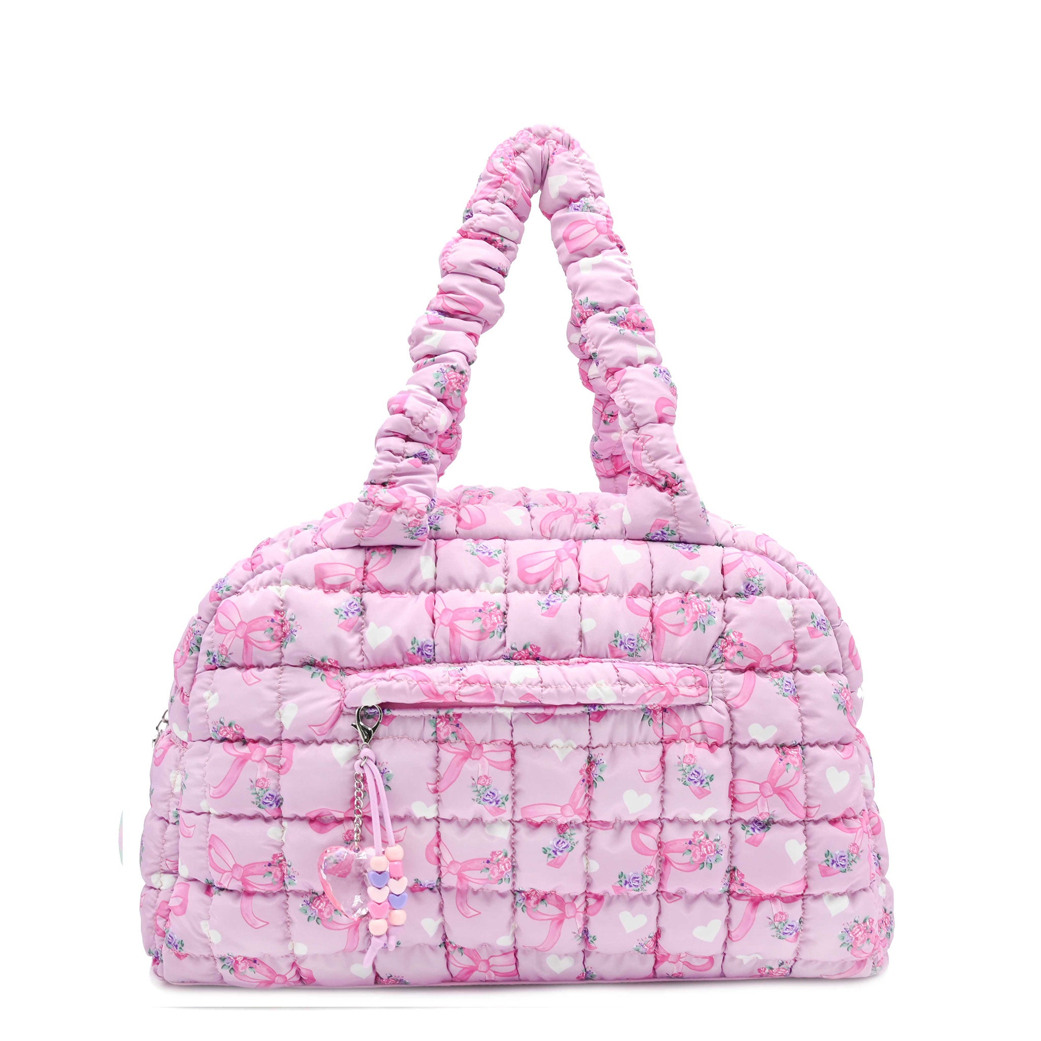 front facing view of a pink medium sized quilted scrunch nylon duffle bag with a bow/heart/floral print and front beaded zipper pocket with a crystal heart charm