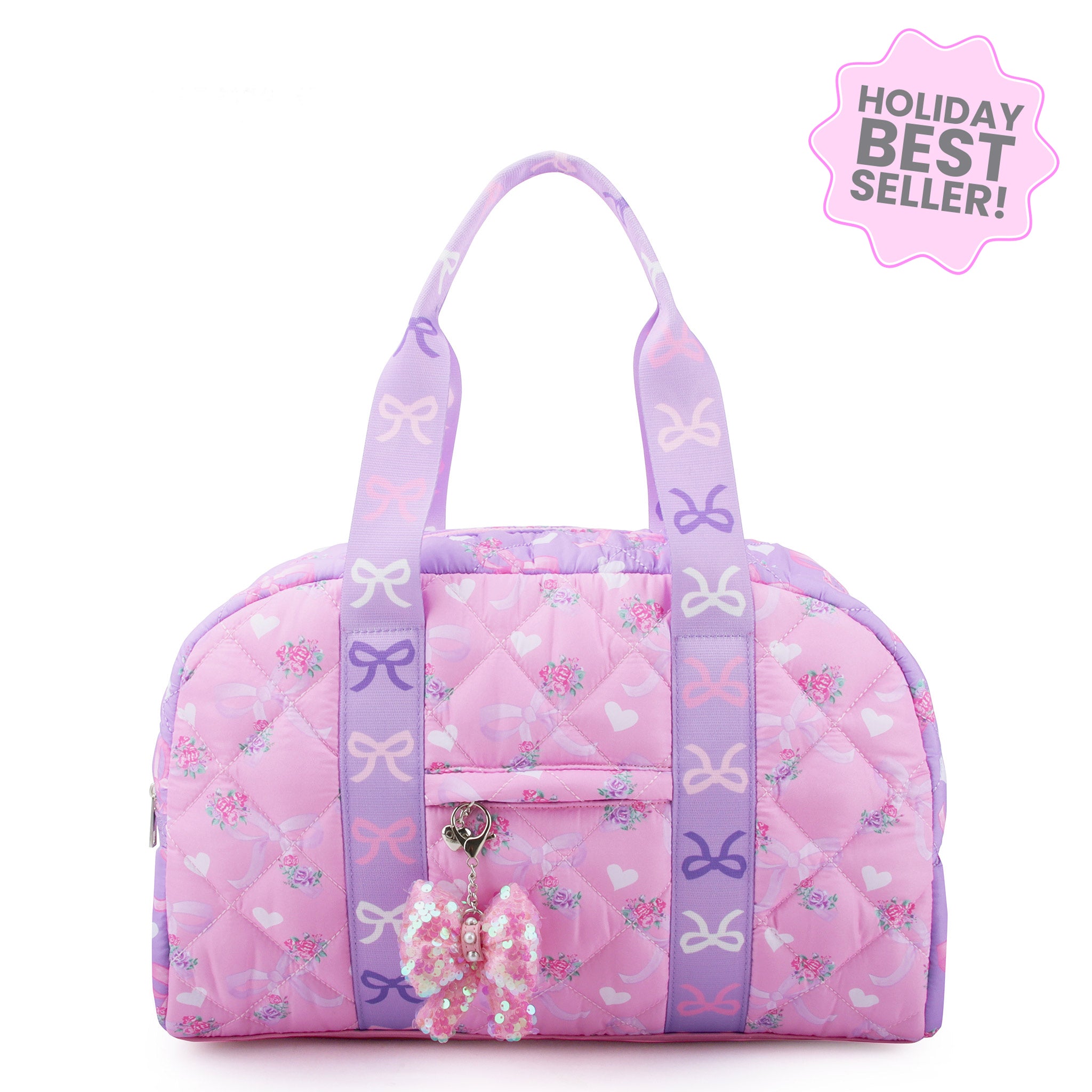 front view of a pink & purple color blocked floral & bow print medium duffle bag. Sequin bow charm included
