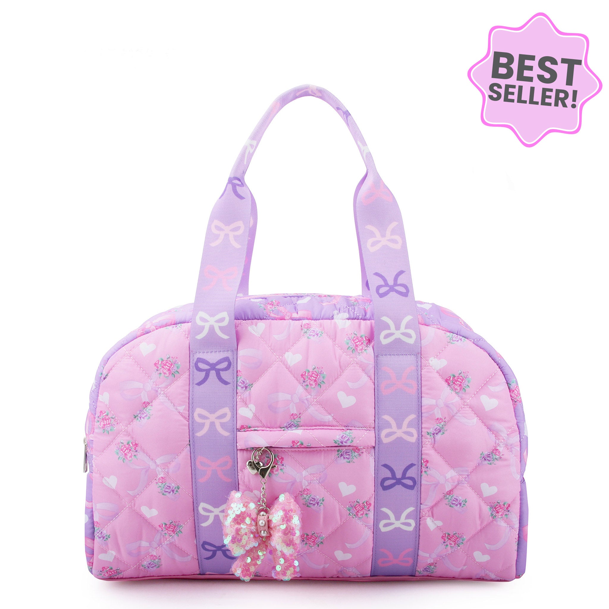 front view of a pink & purple color blocked floral & bow print medium duffle bag. Sequin bow charm included