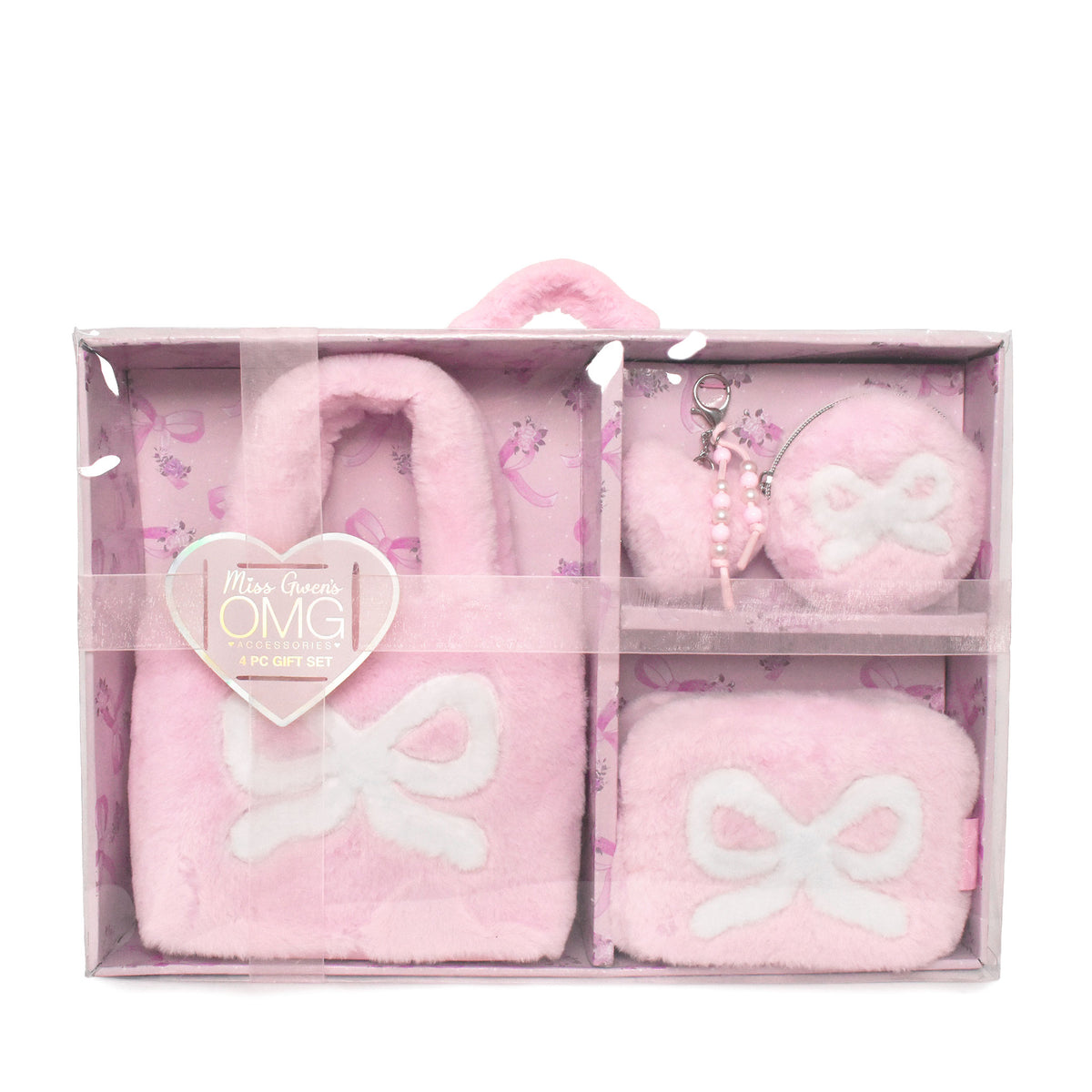 A pink plush gift set in a clear plastic box with a handle, containing a large bow-patterned mini tote, a small round pouch , a plush heart and faux pearl keychain, and a small rectangular pouch, all in soft pink with white bow accents.