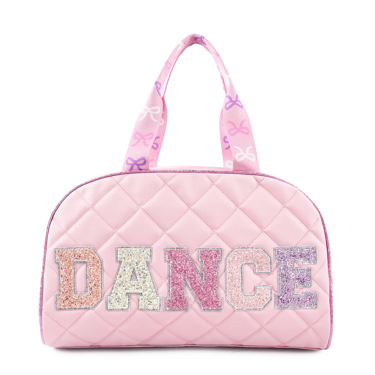 A pink quilted duffle bag with 'DANCE' spelled out in glittery letters across the front, featuring two top handles with a bow pattern.