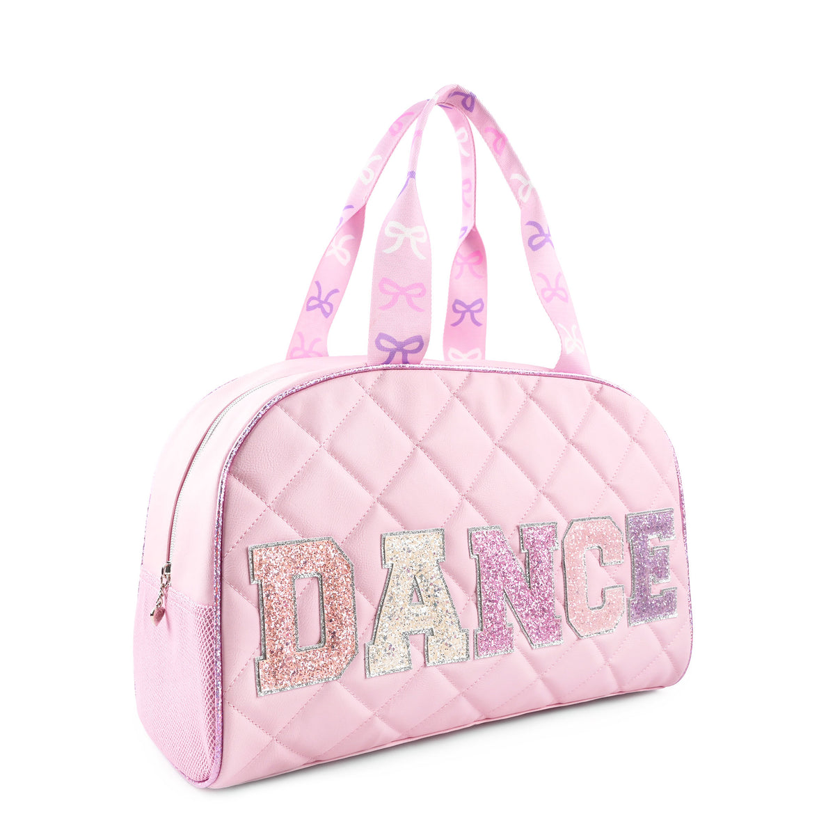 A pink quilted duffle bag with 'DANCE' spelled out in glittery letters across the front, featuring two top handles with a bow pattern.