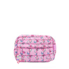 front facing view of a pink quilted nylon scrunch pouch with a printed floral pattern and front beaded zipper closure pocket