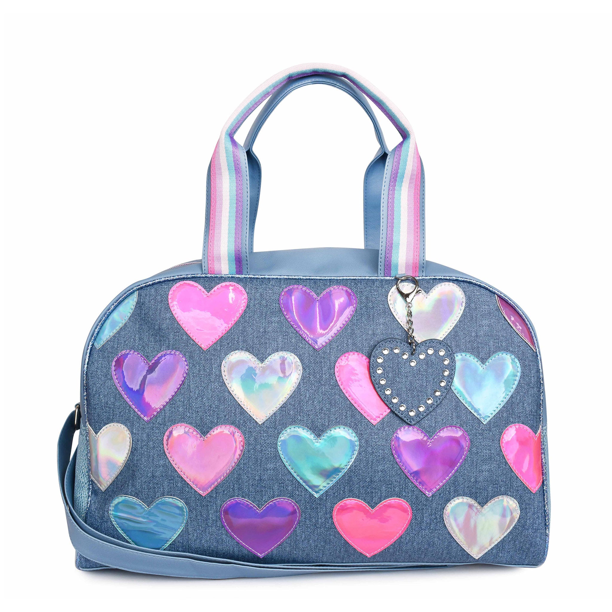 Front view of a denim large duffle bag with metallic heart patches and a heart shaped keychain 