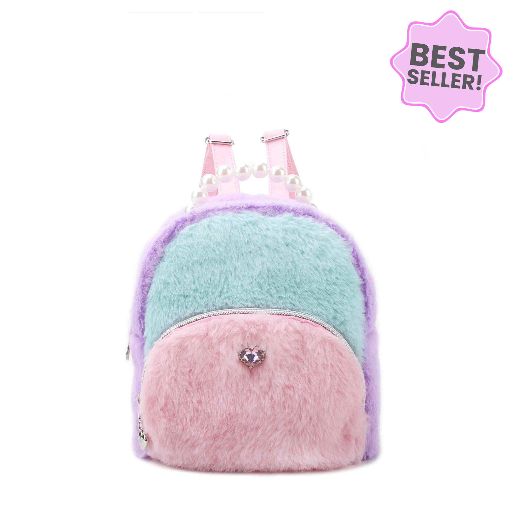 front view of a pink quilted micro mini backpack with bow, heart, & pearl gems. topped with a pearl beaded top handle