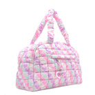 3/4 facing view of a quilted nylon heart print medium sized duffle bag with front zipper pocket and beaded/crystal heart zipper charm