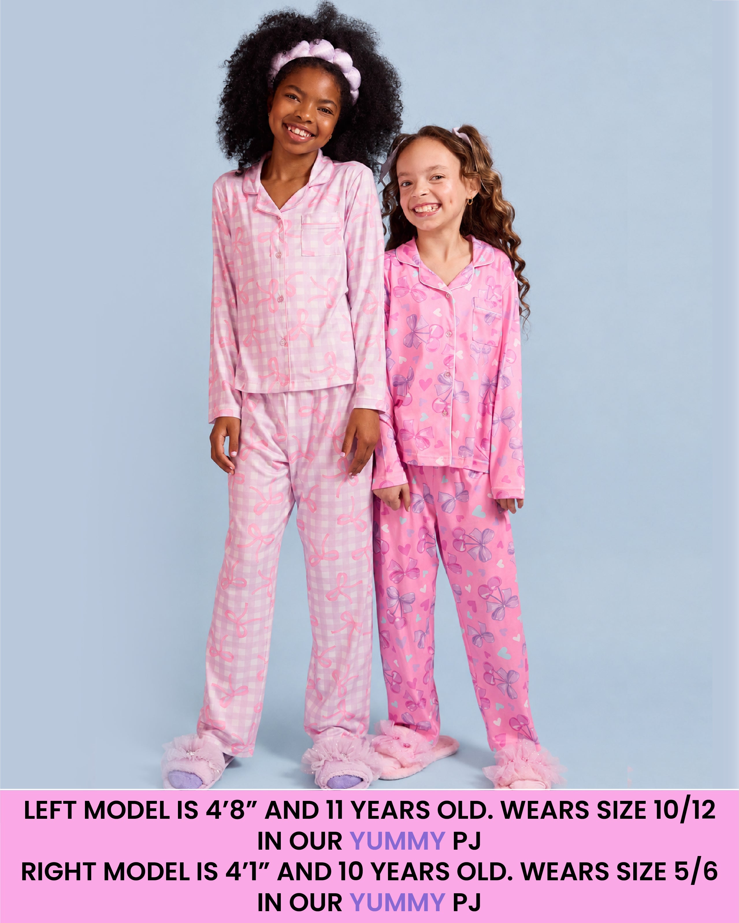 Two girls modeling pink patterned pajamas against a light blue background, with text at the bottom detailing size information for Yummy PJ.