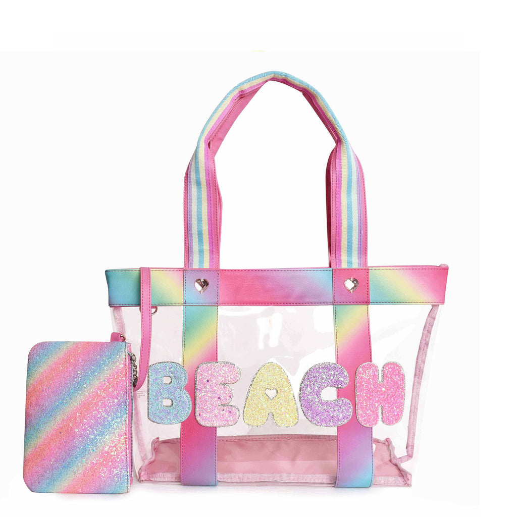 Front view of a clear beach tote with glitter bubble letters 'BEACH' and a glitter detachable pouch
