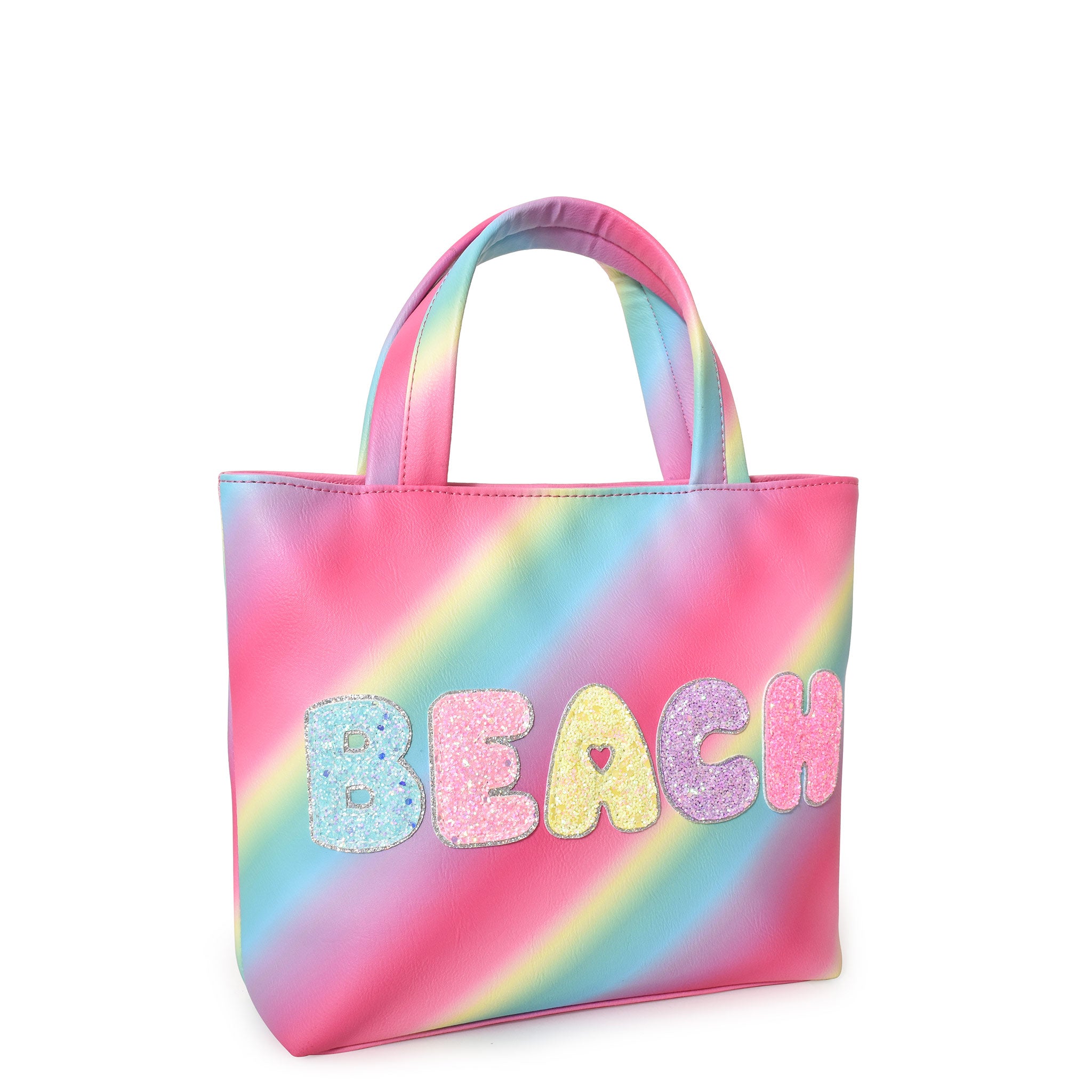 Side view of a rainbow ombre mini tote bag embellished with glitter bubble letters 'BEACH' appliqué.