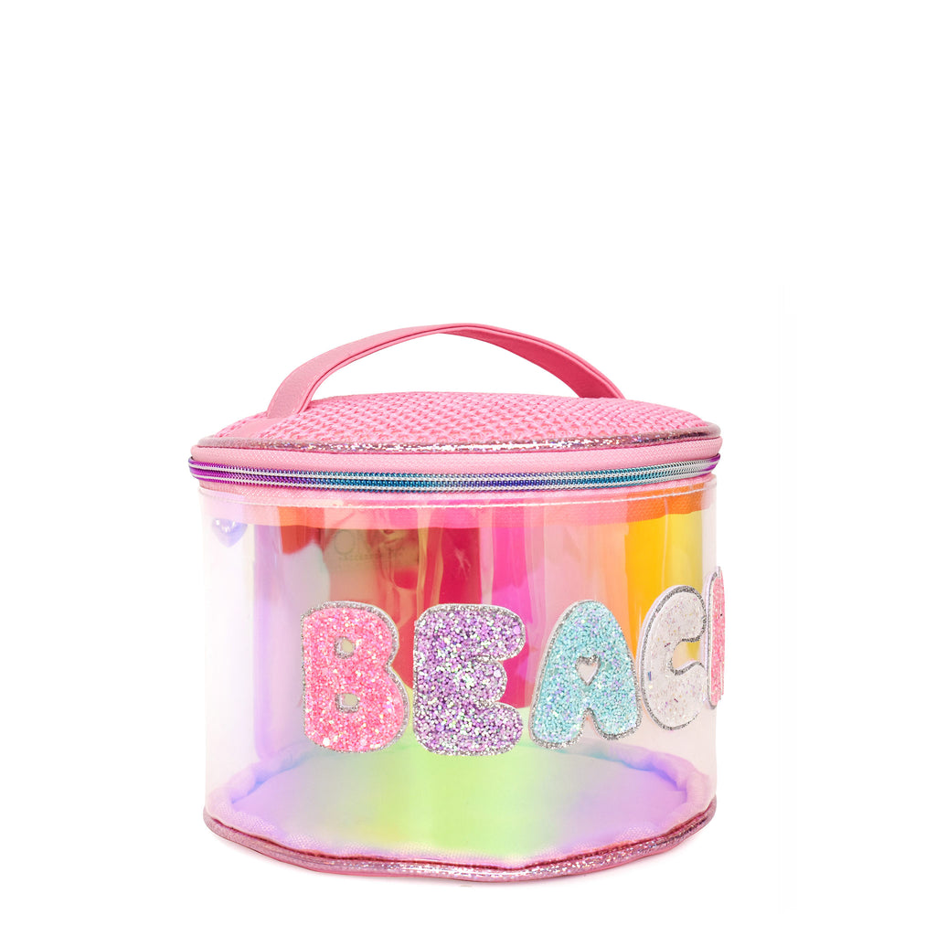 Side view of a pink clear glazed round train case with glitter bubble letters 'BEACH'