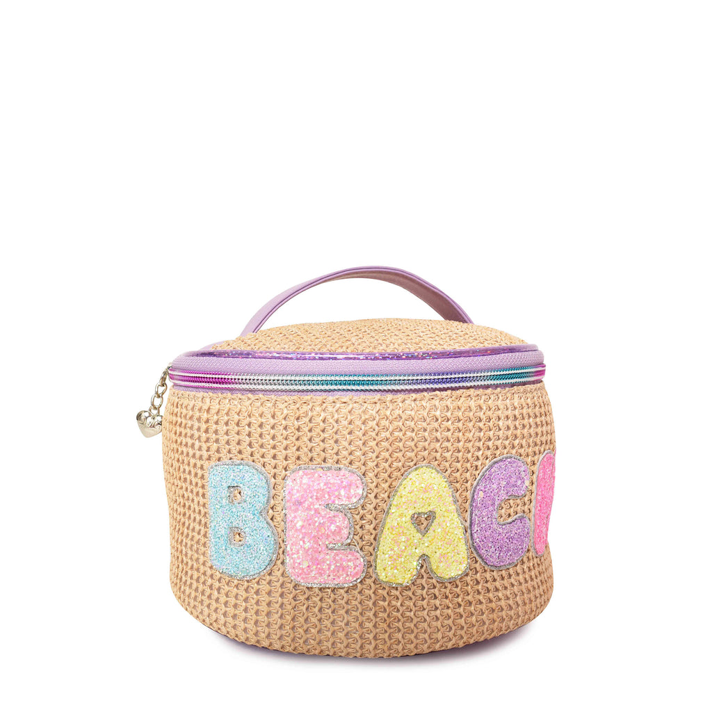 Side view of straw rounded glam bag with glitter bubble letters 'BEACH' appliqué.
