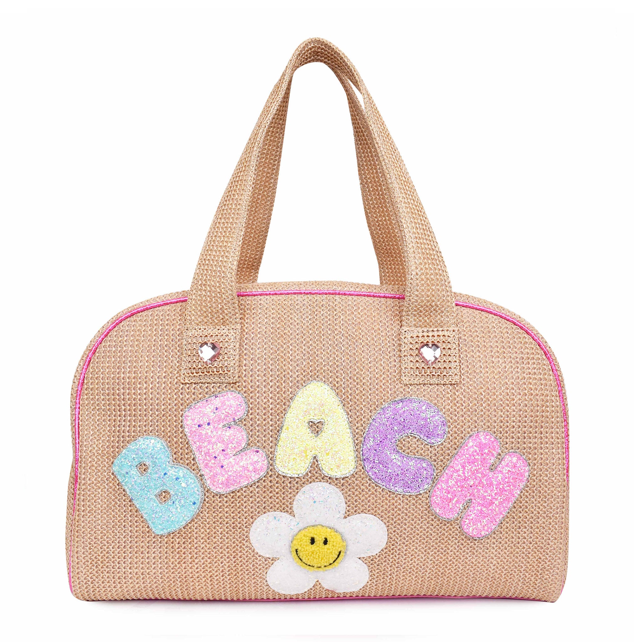 Front view of a straw medium duffle bag embellished with glitter bubble letters 'BEACH' and smiley face daisy appliqués 