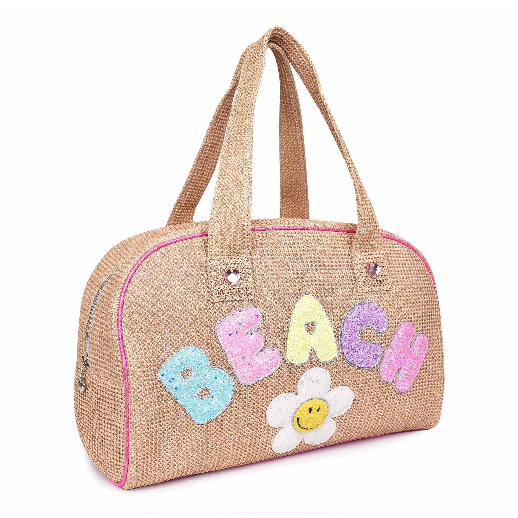 Side view of a straw medium duffle bag embellished with glitter bubble letters 'BEACH' and smiley face daisy appliqués