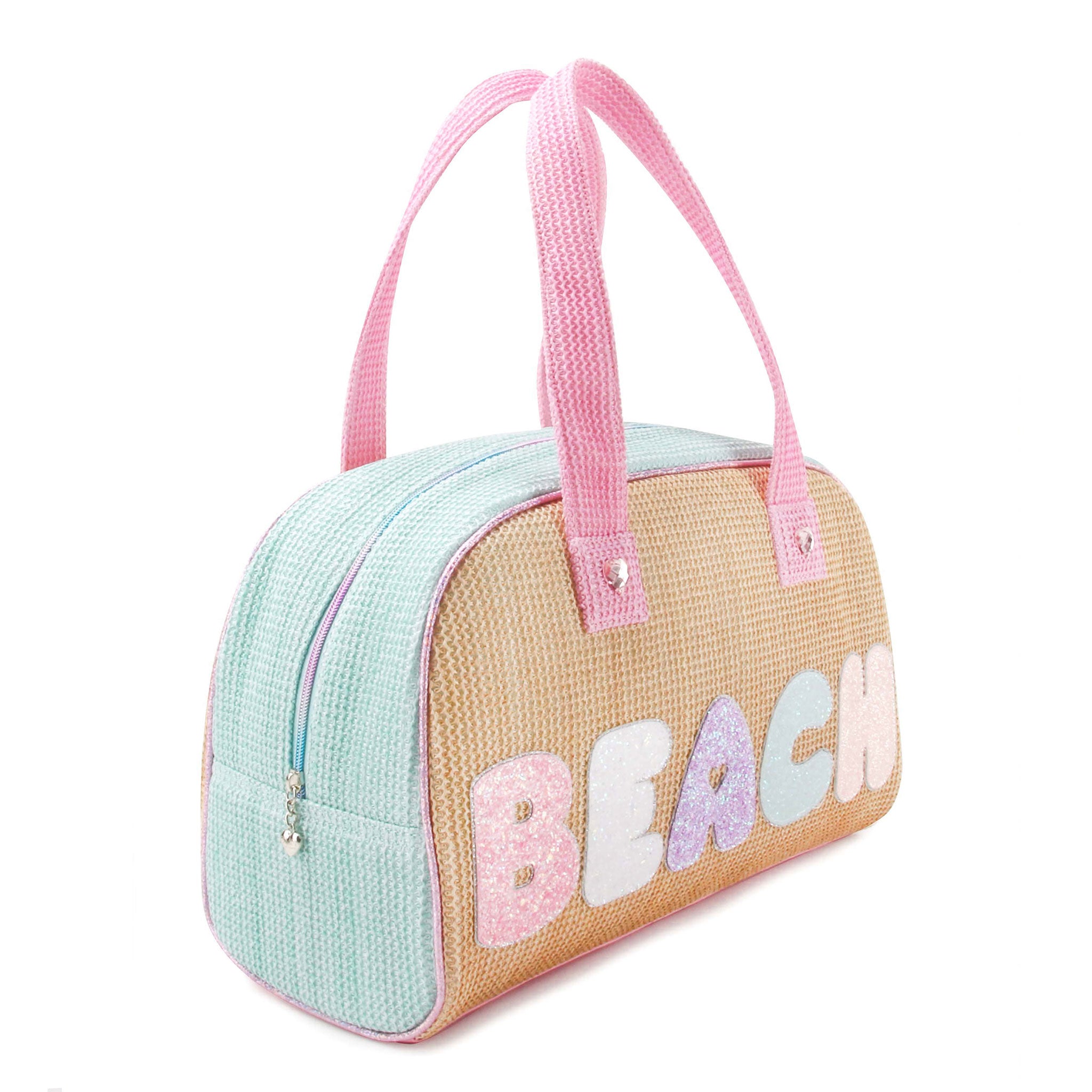 side view of a straw colorblocked medium beach bag with glitter letters 'beach'