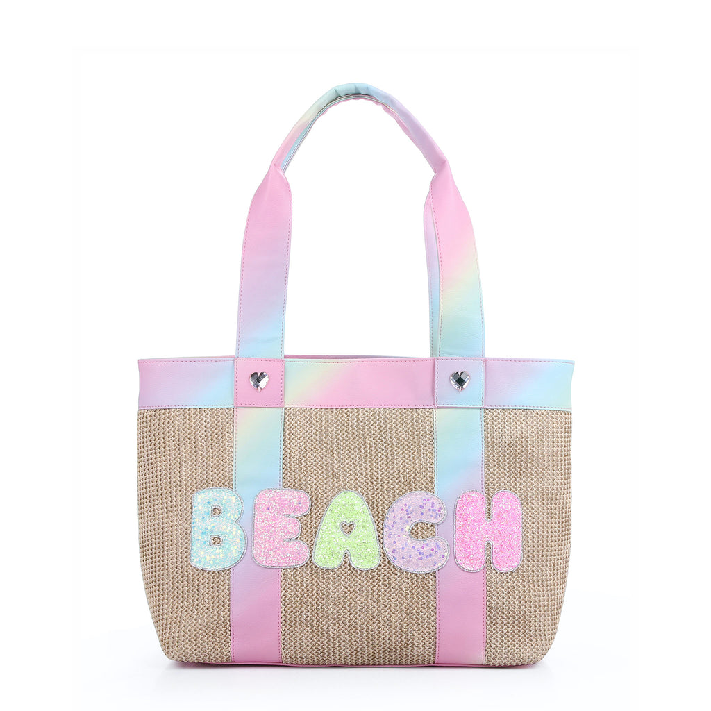 Front view of straw beach tote bag with glitter bubble letters' 'BEACH'  and ombre straps 