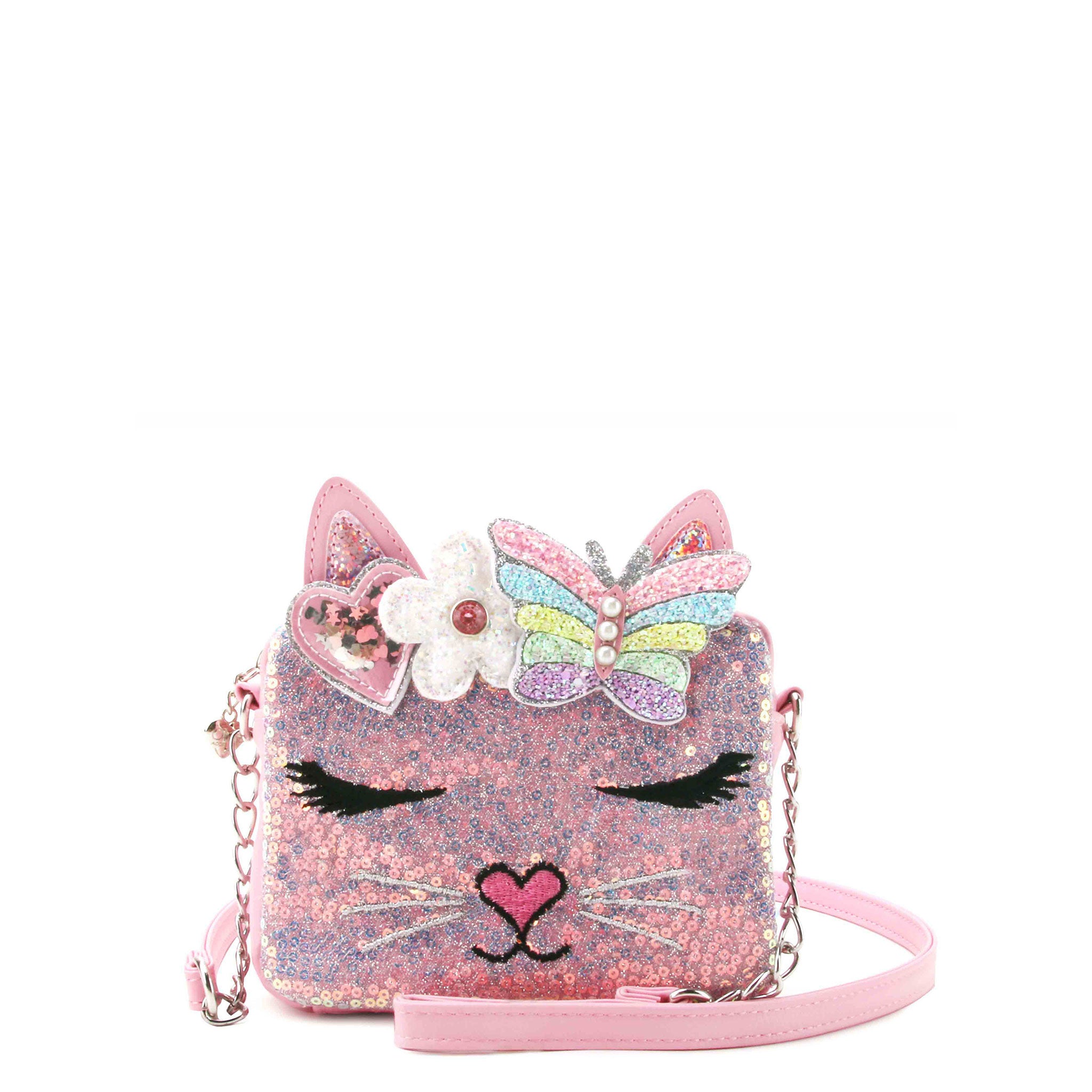 front view of a sequin kitty face crossbody bag with a glitter butterfly  crown applique