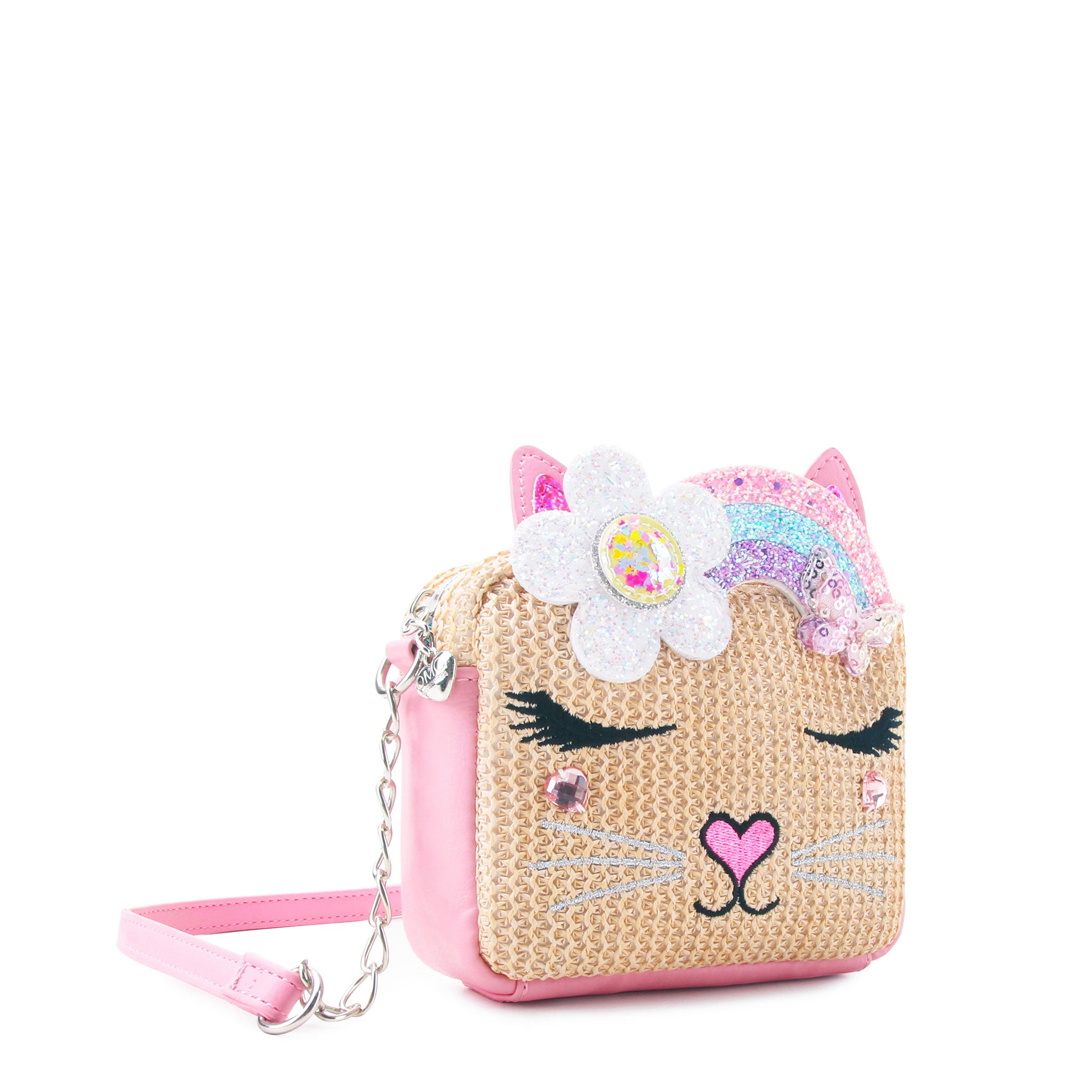 side view of a straw kitty cat crossbody with a glitter rainbow crown