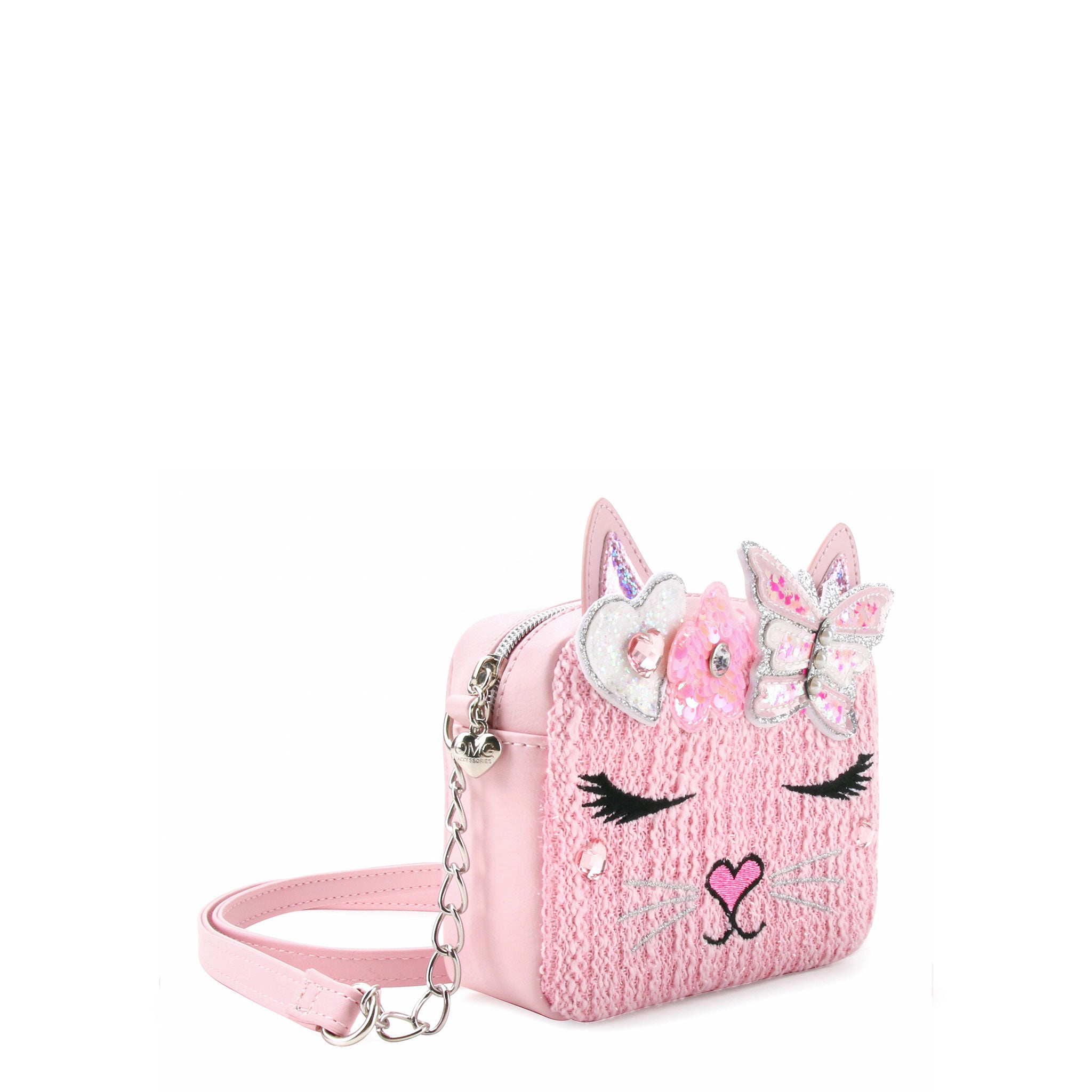 side view of a pink tweed kitty cat crossbody with a confetti filled butterfly & flower crown appliqué 