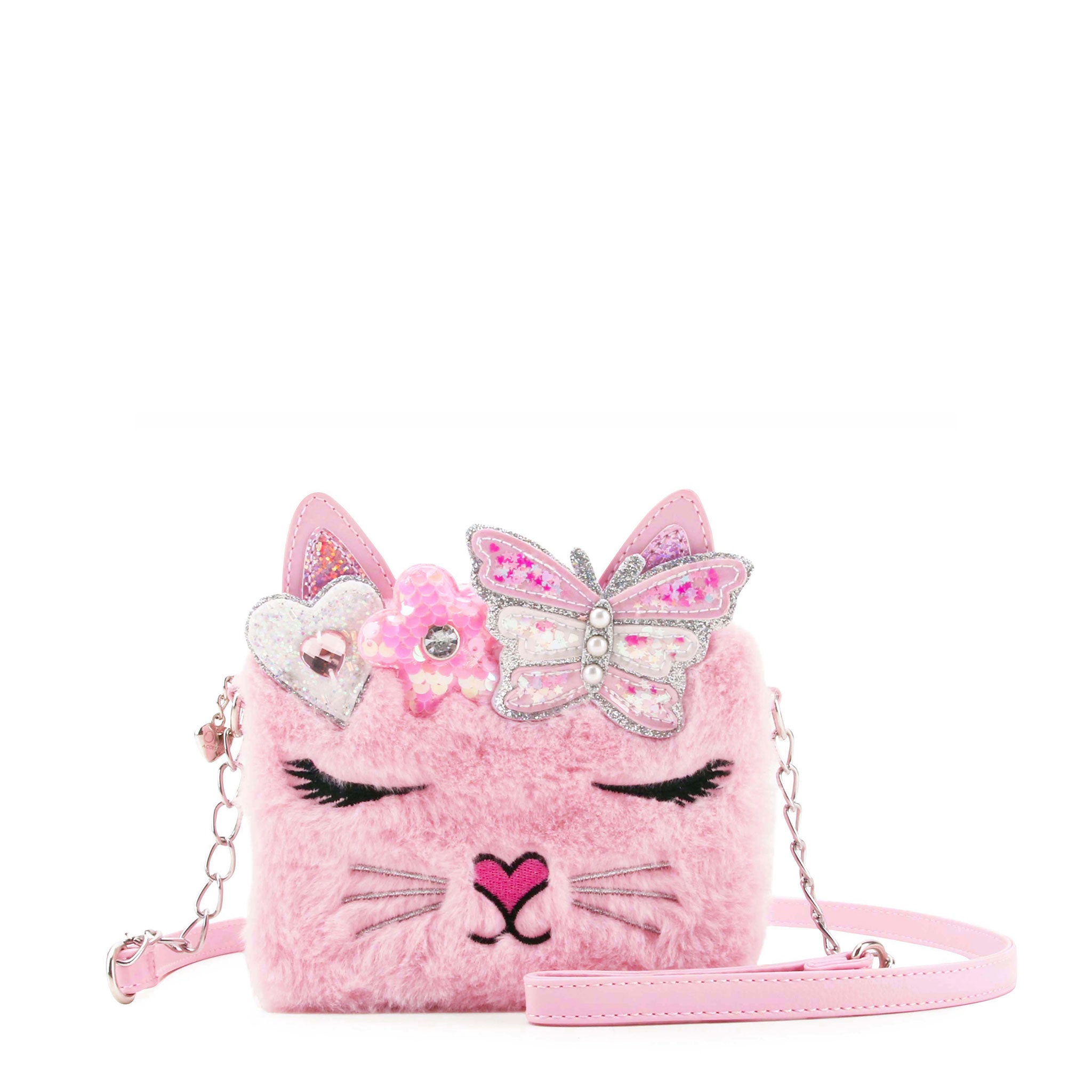 front facing view of a pink faux fur kitty mini bag with crossbody strap 