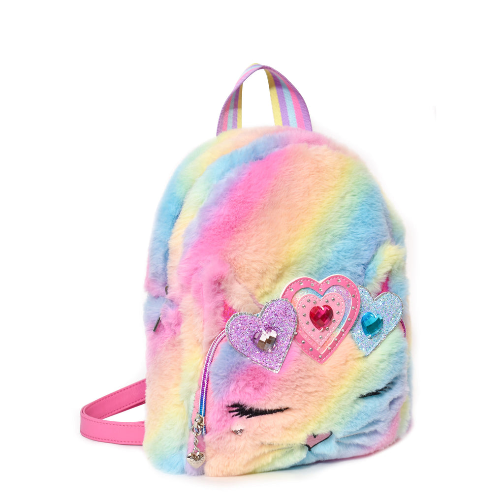 Side view of a ombre plush cat face mini backpack embellished with a glitter and rhinestone heart crown appliqué.