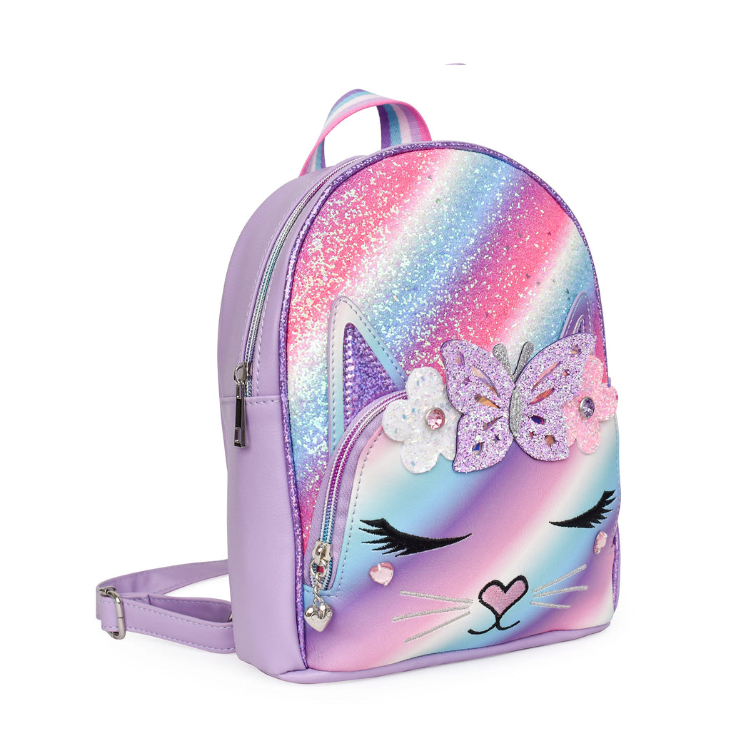 Side view of a glitter stripes kitty face backpack embellished with a glitter flower and butterfly crown.