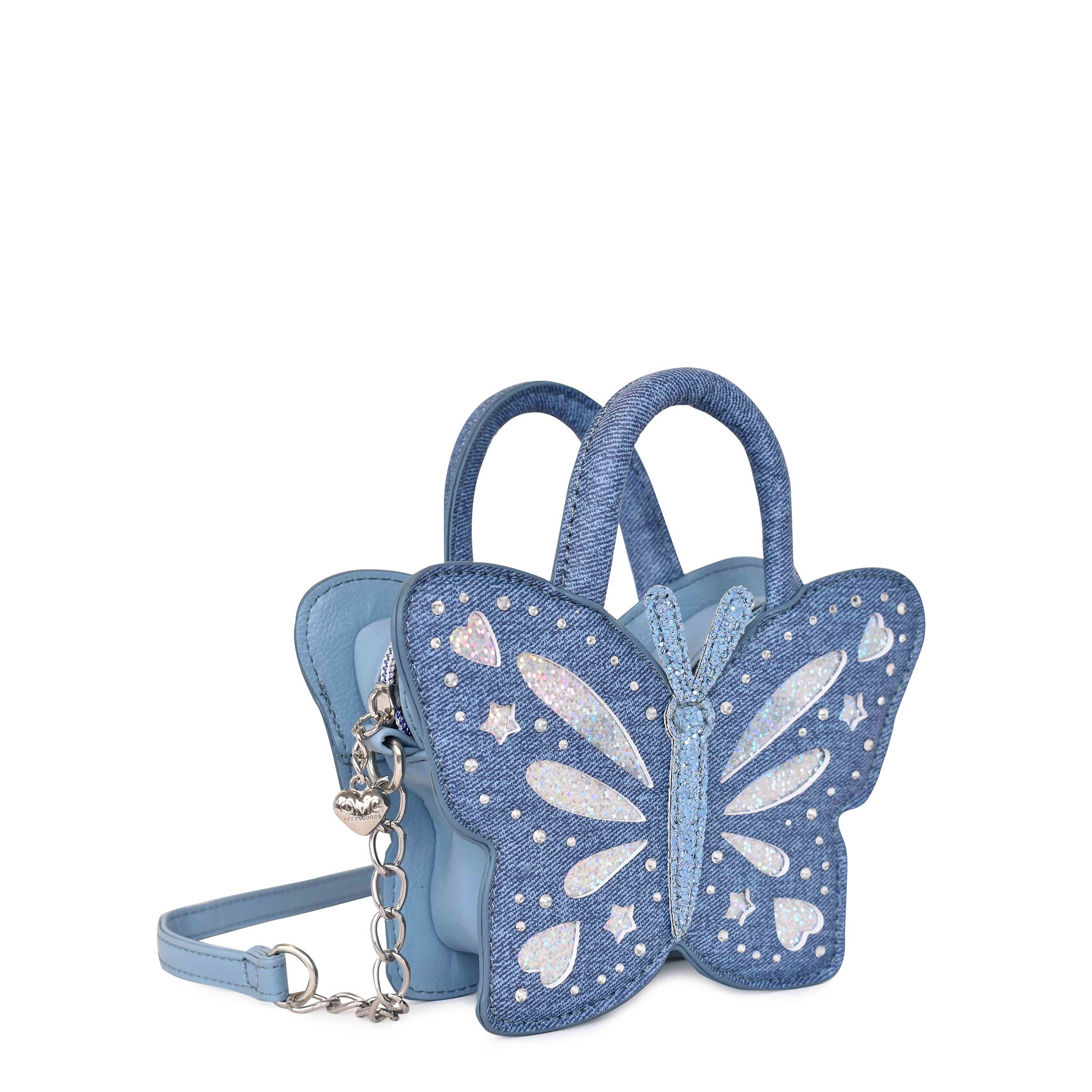 Side view of a denim butterfly shaped top handle crossbody bag with rhinsestones