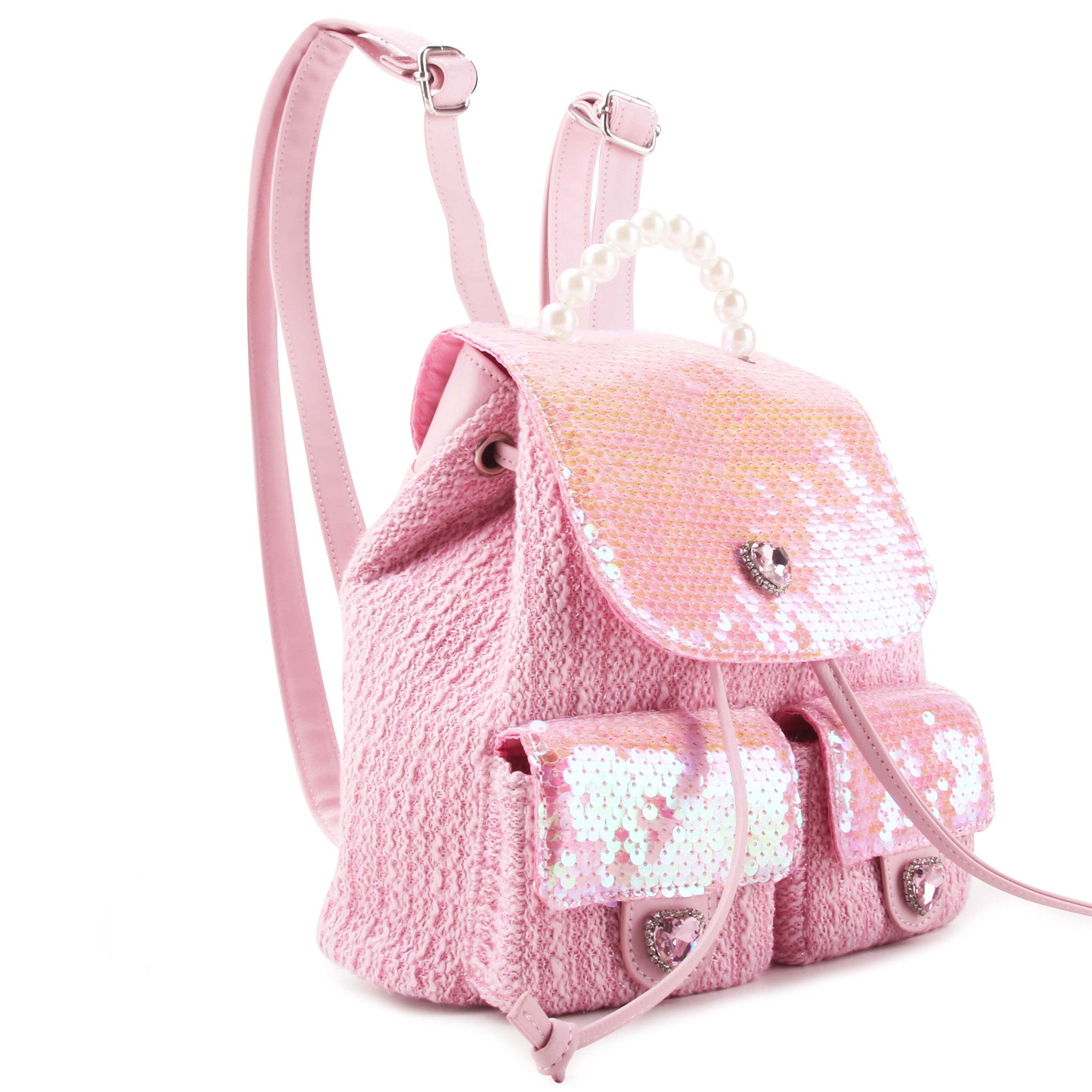 side view of a pink sequin & tweed drawstring mini backpack with a pearl beaded top handle