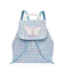 Front view of a blue tweed, flap front, drawstring closure mini backpack with a pearl handle and a glitter butterfly applique