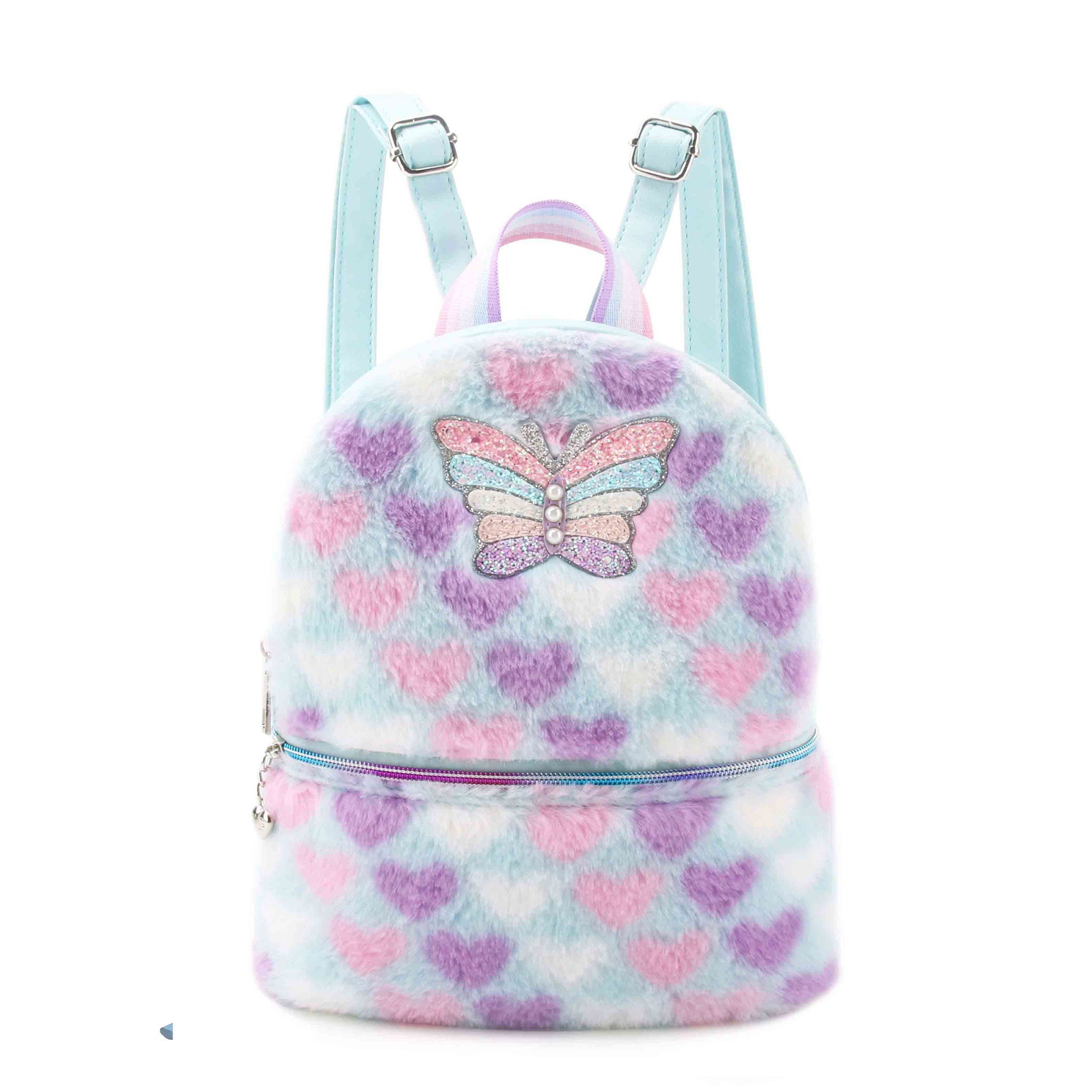 Front View of a light aqua heart printed plush mini backpack with a glitter rainbow applique patch