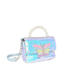 side view of a sequin flap front mini bag with a beaded pearl top handle with a glitter butterfly closure appliqué 
