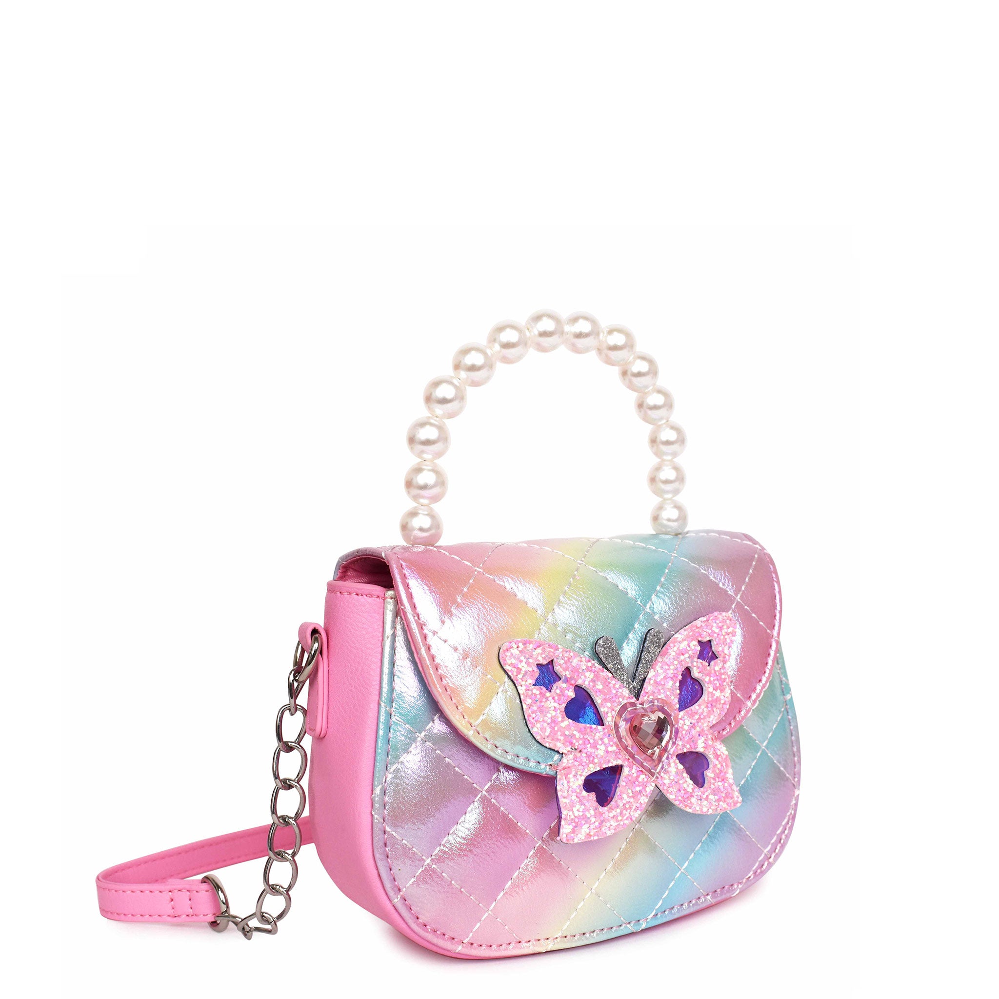Side view of a metallic ombre quilted crossbody bag. Glitter butterfly closure button and pearl top handle.