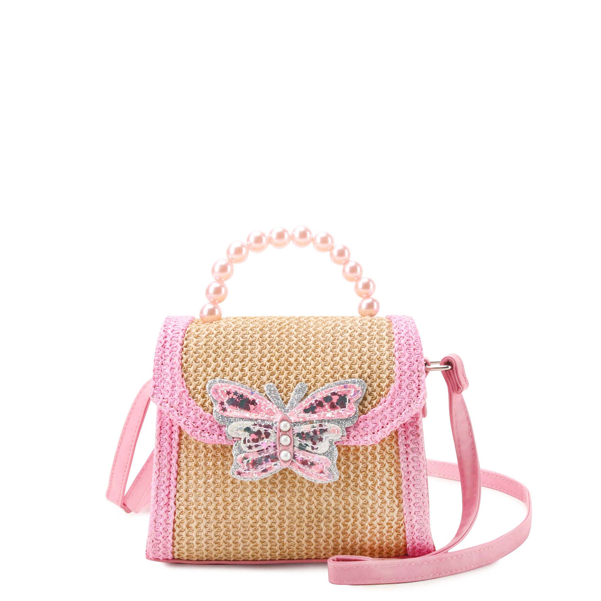 Front view of a straw top handle crossbody bag with a pink pearl beaded handle and a confetti filled butterfly patch.