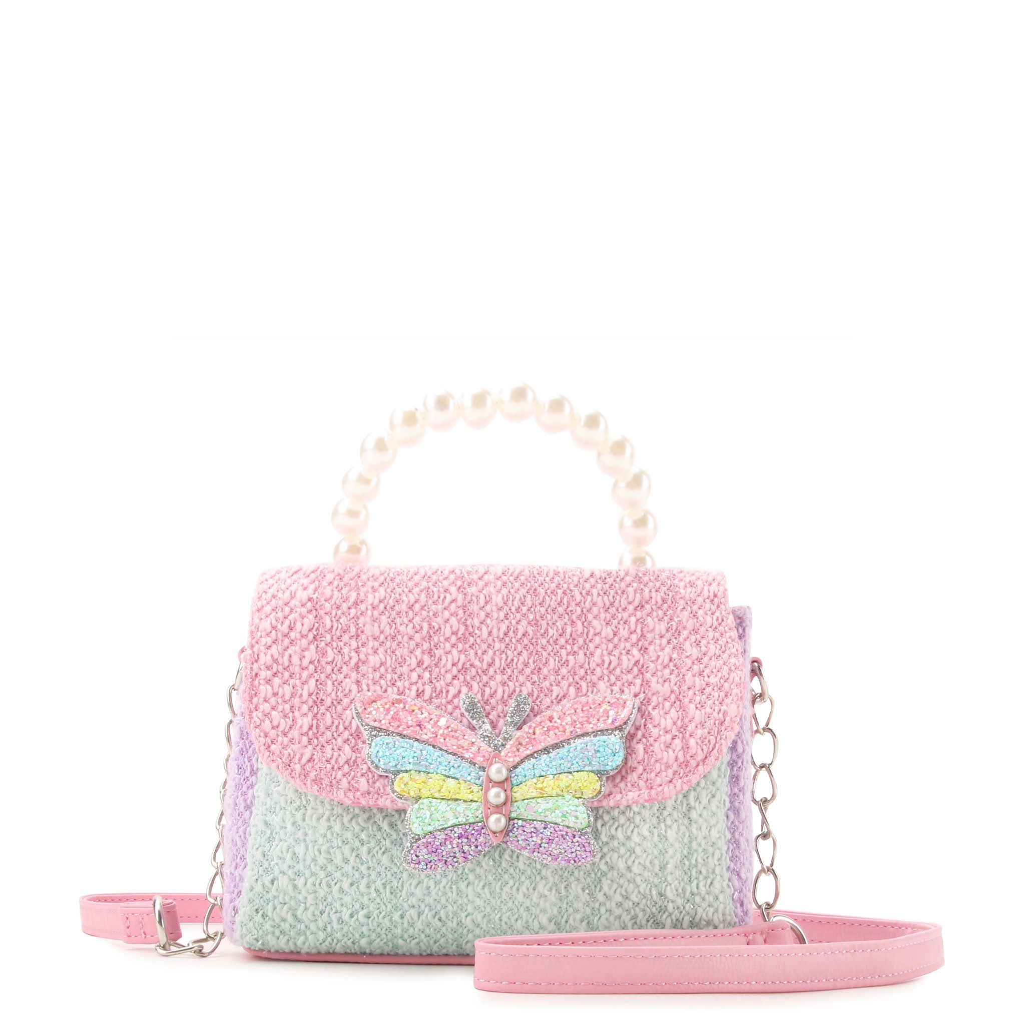 front view of a colorblock tweed crossbody bag with a glitter butterfly appliqué with a pearl top handle 