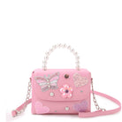 Pink handbag with decorative elements on a white background