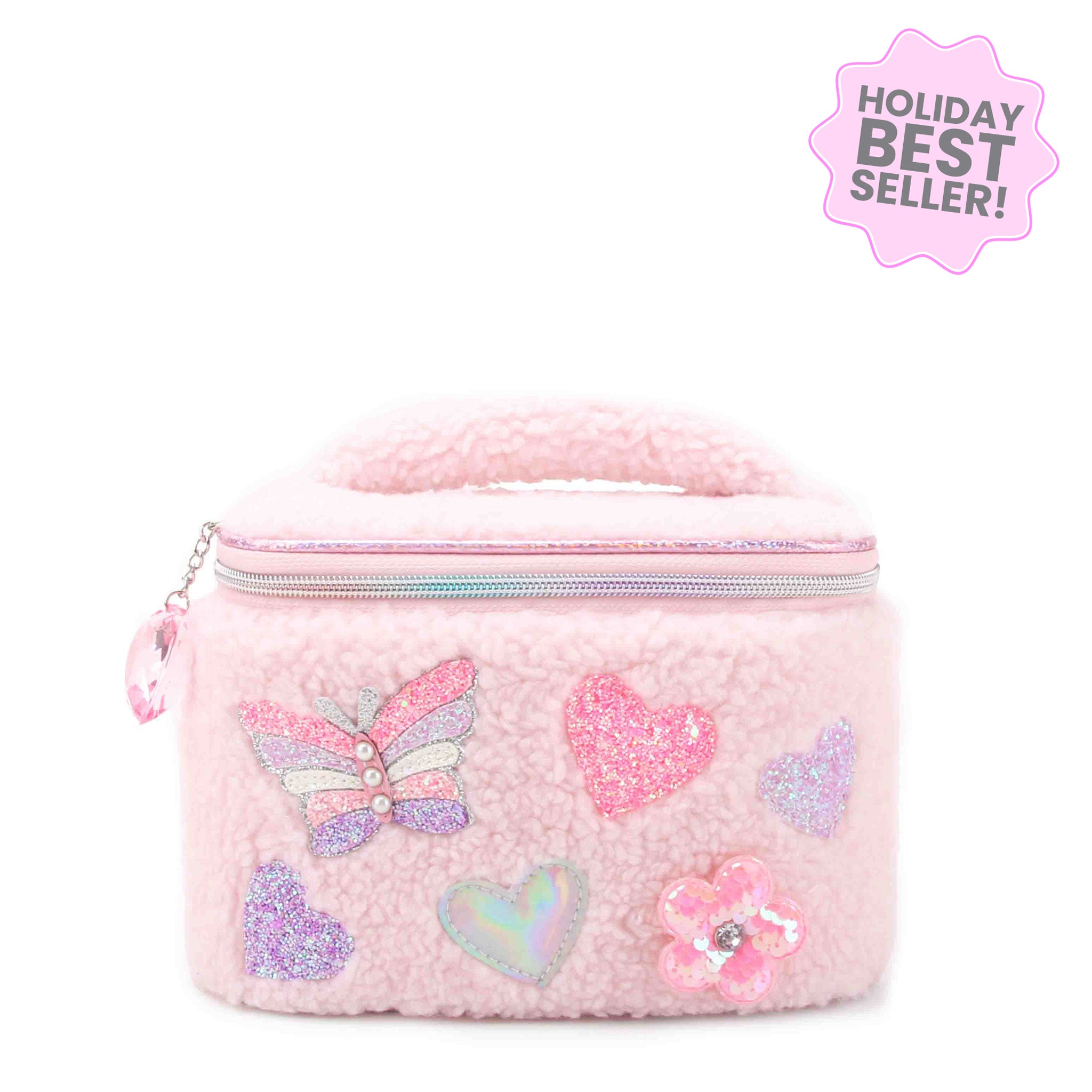 Pink sherpa train case with butterfly, heart, and flower qppliques