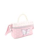 Side view of a polka dotted bucket crossbody bag with a confetti filled butterfly appliqué and pearl top handle
