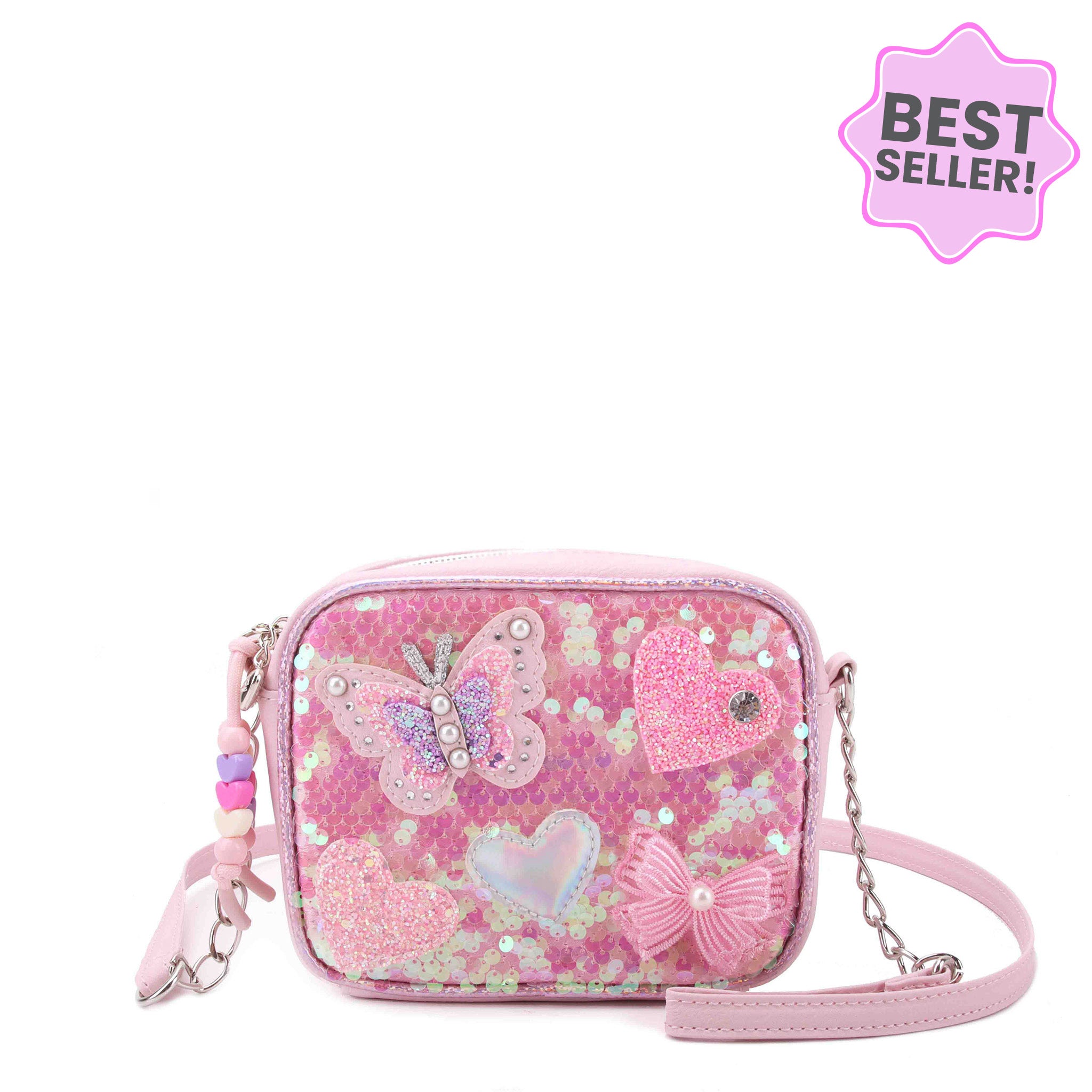 Pink sequins crossbody bag with butterfly, heart, and bow appliques
