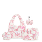 A pink and white plush gift set eaturing a fuzzy hobo bag, matching pouch, and keychain accessories decorated with bows and butterfly motifs.