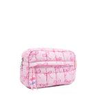 3/4 facing view of a pink quilted nylon pouch with a front beaded zipper pocket and pink bow printed pattern