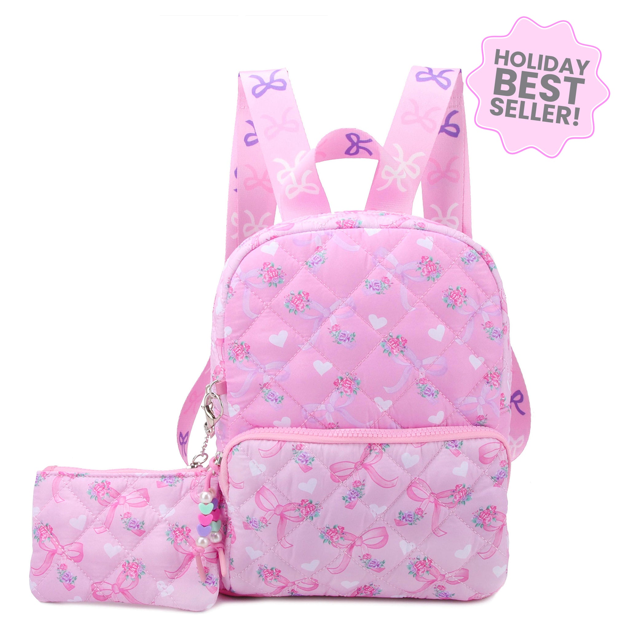Pink backpack with bow pattern and matching pouch on a white background, labeled as a holiday best seller.
