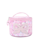 front view of a bow printed confetti filled rounded train case with a glitter bow applique & heart gem charm