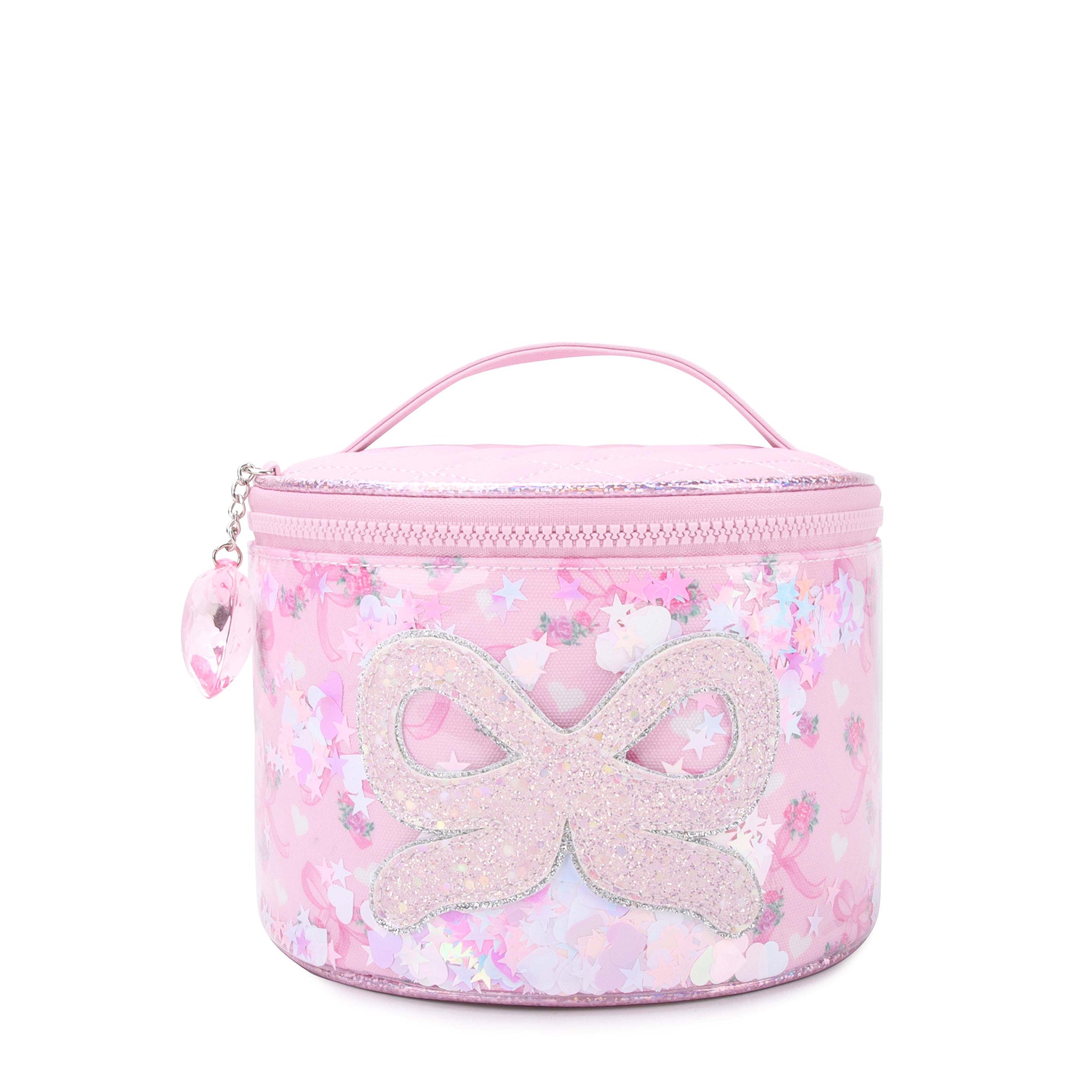 front view of a bow printed confetti filled rounded train case with a glitter bow applique & heart gem charm