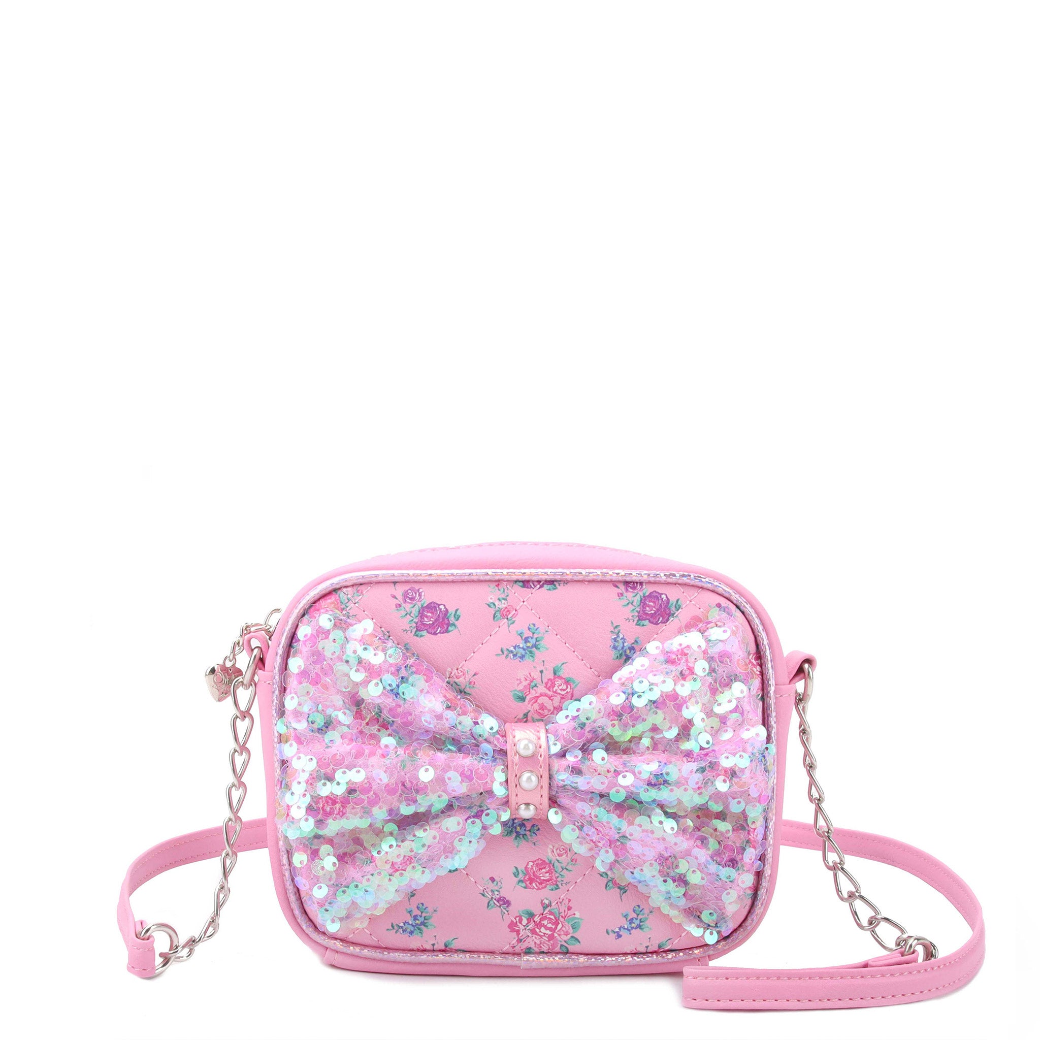 front view of a floral printed crossbody bag with a sequin bow covering front 