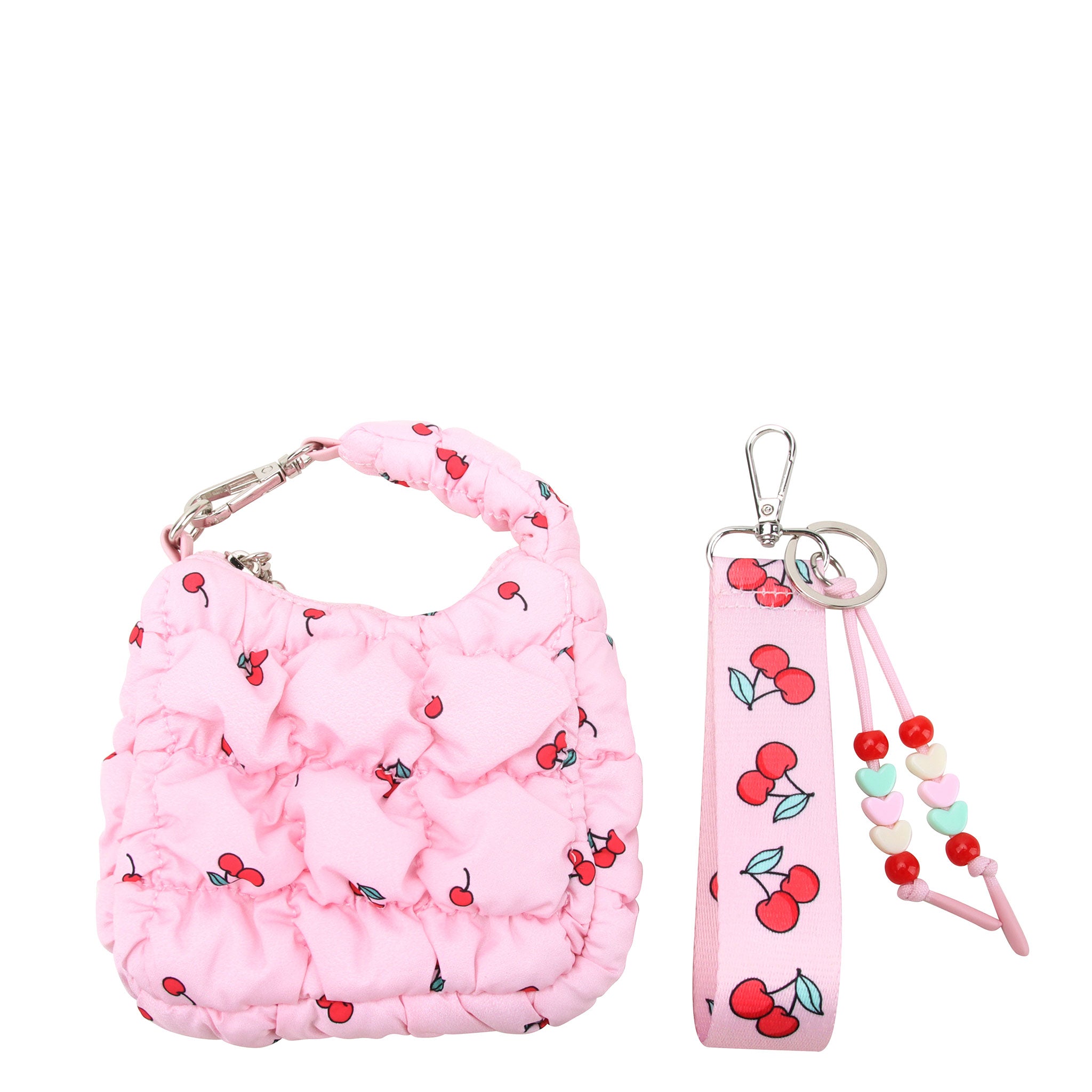 front view of a quilted pink cherry printed crescent shaped keychain and a pink cherry printed lanyard keychain with beaded detailing.
