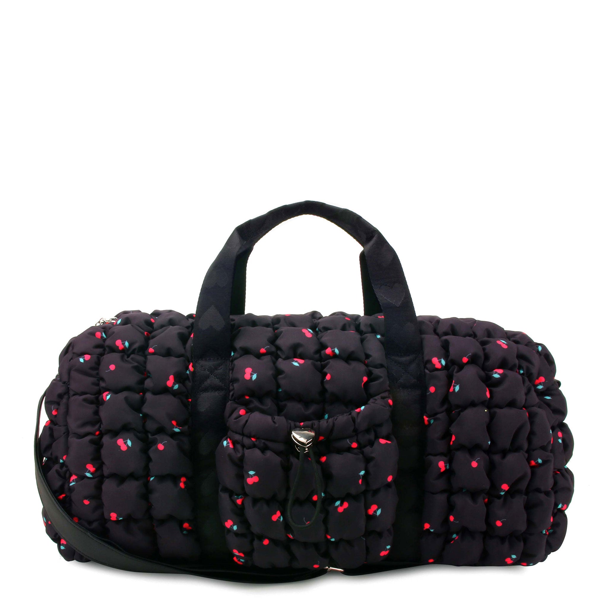 front facing angle of a black quilted duffle with red cherry print and a crossbody strap