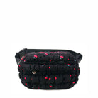 front view of a black cherry printed quilted scrunch fanny pack with front zipper pocket